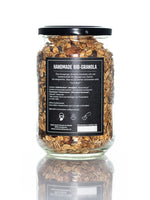 Nuts and Friends, Feines veganes Bio-Granola-Müesli, The Chocolate, in Schraubglas Rückseite vor weissem Hintergrund